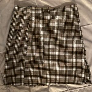 Plaid grey, black, white, and red mini skirt